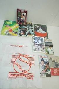 lot 167 image: MN Twins Handbooks and Homer Hankies