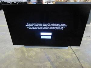 lot 945 image: LG - 65 Class B2 Series OLED 4K UHD Smart webOS TV OLED65B2PUA (CHIP CENTER OF SCREEN, SCRATCHES ON BASE)