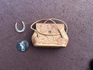 lot 49 image: leather Purse   horse shoe and horse button
