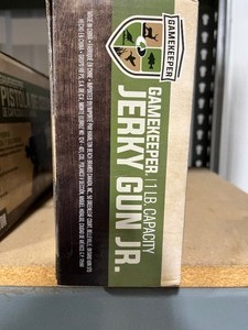 lot 59 image: Game Saver Jerky Gun  NEW