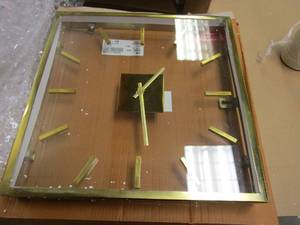 lot 610 image: Grayson Lane 16 In. x 16 In. Wall Clock with Clear Face Gold Stainless Steel