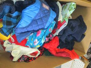 box of overstock pet clothes...