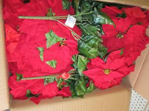 box of faux poinsettia bushes...