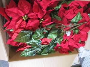 box of faux poinsettia bushes...