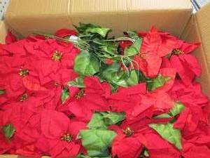 box of faux poinsettia bushes...