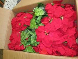 box of faux poinsettia bushes...