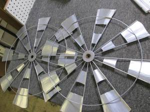 2 metal windmill parts...