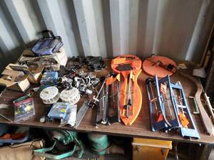 Table Full of Ice Fishing and Fishing Equipment