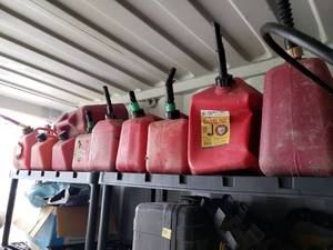 All Gas Cans Pictured on TOp Shelf