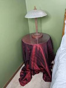 lot 85 image: Round Table with Glass for the Top and Lamp