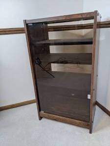 lot 78 image: Wooden Bookshelf with a Clear Door