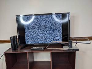 lot 77 image: 32 Toshiba Television, RCA Digital TV Converter and Terk Antenna