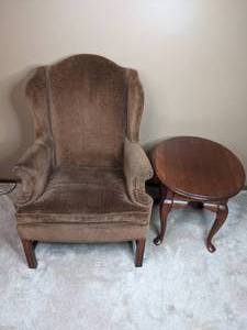 lot 83 image: Brown High Back Winged Arm Chair and Round Lenoir House Table