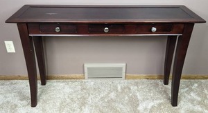 lot 37 image: Stately Dark Wood Entry Table with 3 Drawers