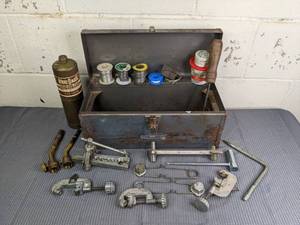 lot 65 image: 14 Ounce Propane Bottle and Grey Toolbox with Clamps, Wire, Compound Paste and More