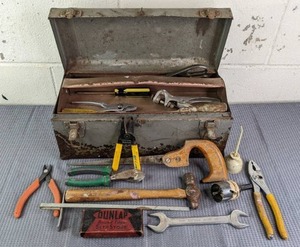 lot 59 image: Vintage Toolbox with Collection of Hand Tools Saw, Ball Peen Hammer, Pliers, Screwdrivers, Dunlap Round Edge Slip Stone, and More