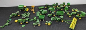 lot 6 image: A Collection of Miniature John Deere Tractors and Farm Equipment