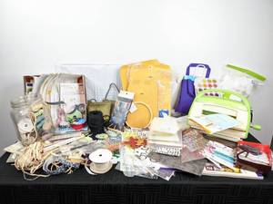 lot 110 image: Cricut Cuttlebug Papercrafting Machine & Accessories, Assorted Scrapbooking Materials (Stickers, Craft Twine, Paper), and more