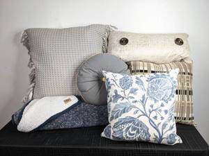 lot 93 image: An Assortment of Throw Pillows Threshold, Room Essentials, Sheffield Home, and Ugg Blanket