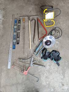 lot 150 image: Shop Lights, Levels, Caulking Guns, 48-Inch Aluminum Ruler and More