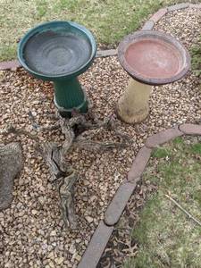 lot 153 image: Set of Two Bird Baths and Driftwood