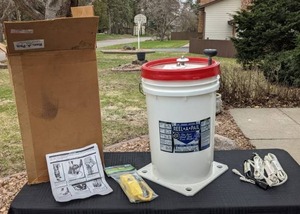 lot 147 image: Reel A Pail Extension Cord Reel, Portable GFCI, and More