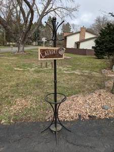 lot 154 image: Vintage Stand-Up Coat Rack with Laundry Sign