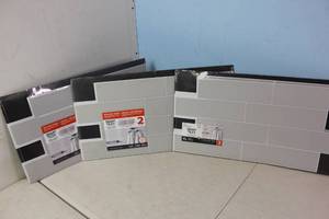 lot 176 image: NEW - 3 PACKS OF Smart Tiles 2pk Oslo XL Glossy Peel & Stick 3D Tile Paper Backsplash Gray 623996202465 MSRP $83.97
