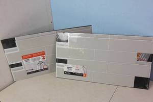 lot 177 image: NEW - 2 PACKS OF Smart Tiles 2pk Oslo XL Glossy Peel & Stick 3D Tile Paper Backsplash Gray 623996202465 MSRP $55.98