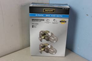 lot 188 image: NEW - Defiant Brandywine Stainless Steel BedBath Door Knob (2-Pack) 050134004863 MSRP $19.00