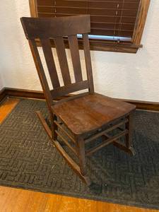 lot 33 image: Dark Oak Wood Rocking Chair