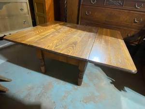 lot 8 image: Golden Oak Coffee Table with Extending Sides