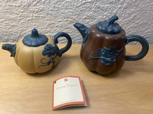 lot 48 image: Two Yixing Leaf Patterned Teapots