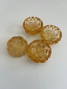 lot 22 image: Amber Glass Vintage Salt Cellars - Set of 4