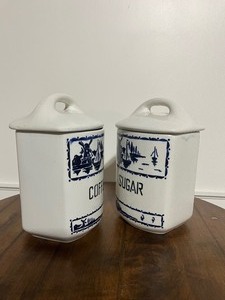 lot 64 image: Antique Pair of Windmill Containers