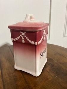 lot 69 image: Antique Ombre Red & White Sugar Container