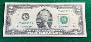 Stack of Crisp $2.00 Bills
