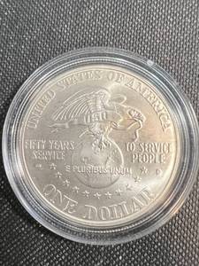 1991 US SILVER DOLLAR IN AIRTITE USO COMMEMORATIVE