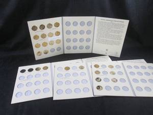 lot 130 image: 4 Books Native American Dollar Coin...