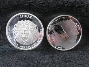 lot 262 image: 2 - 2016 One Dollar Sioux 1 Ounce 9...