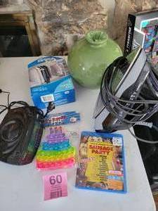 lot 60 image: Timex AM-FM Radio With Alarm-Sausage Party Digital Movie-Pop Poppers Party ToyZiploc Space Bag-Round Vase-1700W Max Iron