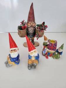 lot 96 image: Four Gnome Items-One Candle Holder-One Carrying 2 Baskets Of Pine Cones, Etc.-Two Seated Gnomes-All Made In Japan