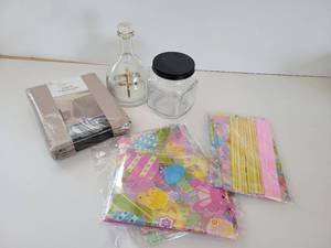 lot 127 image: Fabric Table Cloth-60  x  102 -Holy Water Bottle-Easter Wrapping Paper & Easter Tissue Paper