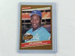 lot 132 image: Bo Jackson Rookie MLB Donruss 86 Highlights No. 43, Longest Home Run in Royals Stadium