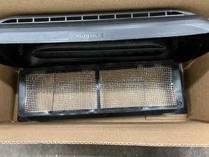 lot 103 image: BLACK PLASTIC FRIDGE VENT