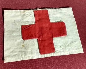 lot 14 image: WWI Red Cross Arm Badge