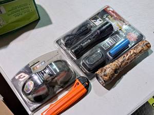 lot 539 image: Lot of (4) Hand ToolsAccessories - AmPro Rechargeable Flashlight, NASCAR #3 Sunglasses, Camo Flashlight, Box Cutter