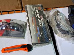 lot 542 image: Lot of (4) Hand ToolsAccessories - MIT Deluxe Tire Chuck, Box Cutter, NASCAR #8 Sunglasses, Safety Goggles