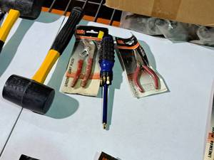 lot 549 image: Lot of (4) Hand Tools - MIT Curved Needlenose Pliers, MIT Groove Joint Pliers, Mallet, Multi-bit Screwdriver