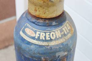 lot 34 image: Freon Tank Approx. 28 Inch Long